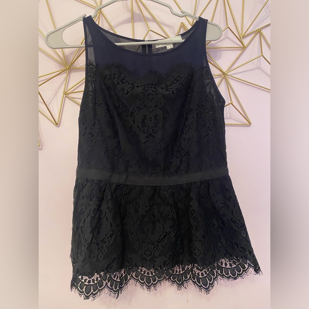 Loft size 4 top. Blue with black lace and zipper in back.